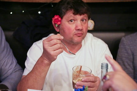 Man tasting dessert at Cup and Cook's event in Sydney.